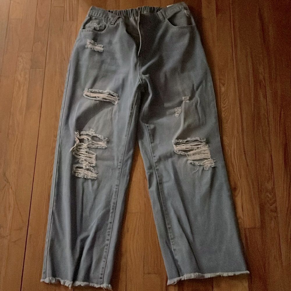 Size 2XL or 16-18 ripped jeans.